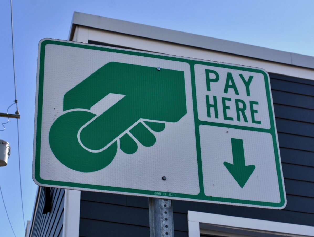The pilot program for Bay Shore’s parking meter system, implemented by the Town of Islip in 2016, requires residents and non-residents alike to pay for parking in downtown Bay Shore.